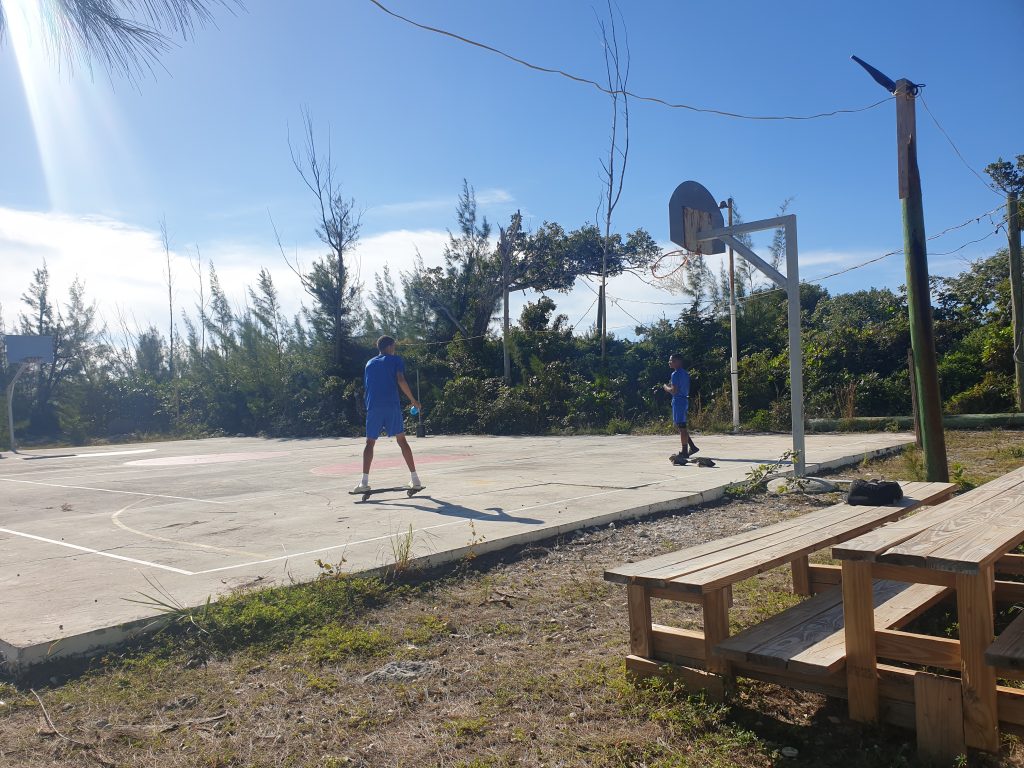 High school ride on ripsticks at Camp Abaco during the 2022-2023 Spiritual Emphasis Week.