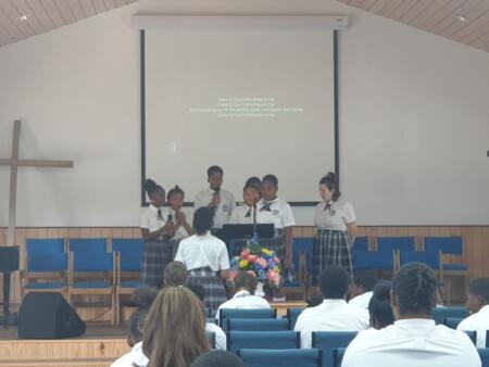 High school students sing during Chapel.