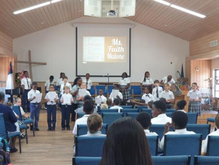 Elementary students participate in Teacher and Staff Appreciation Chapel service.