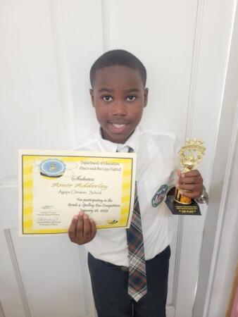 Fourth grader earns trophy for placing third in the Abaco District Fourth Grade Spelling Bee.