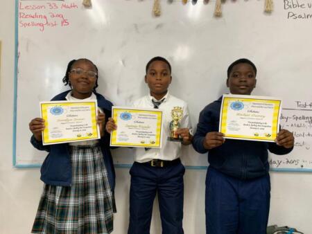 Fifth graders earn certificates for participating in the Abaco District Fifth Grade Spelling Bee.